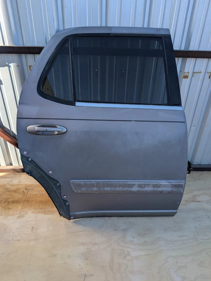 2001-2007 TOYOTA SEQUOIA RIGHT REAR DOOR ASSY SILVER COLOR - OEM