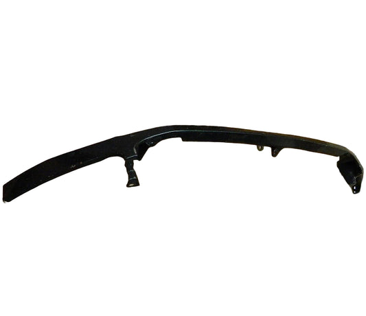 TOYOTA TUNDRA front right headlight filler OEM part in black plastic placed on tiled floor and wooden stool