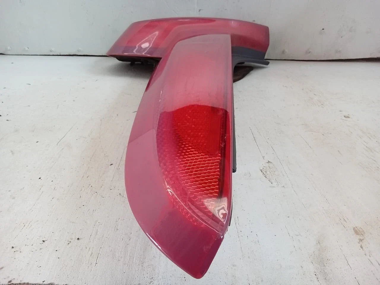 Right rear tail light assembly for 2007-2013 Volvo C30 T5 with red lens and black housing