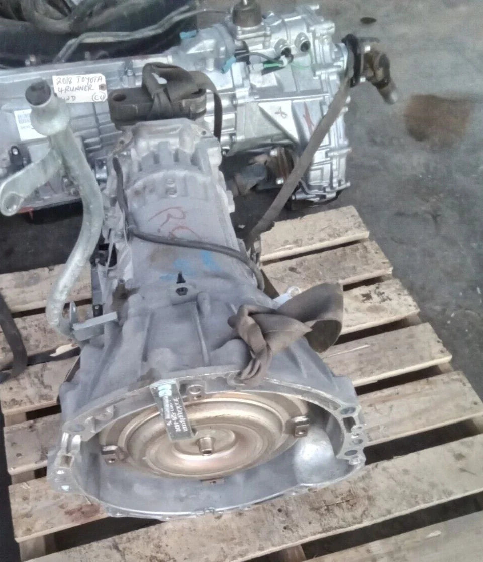 2008 INFINITI G37 automatic transmission assembly with 57,753 miles on wooden pallet