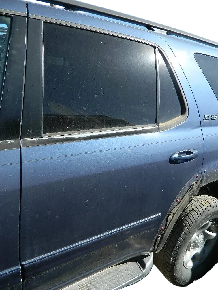 2001-2007 Toyota Sequoia rear left passenger door with normal scratches and complete assembly